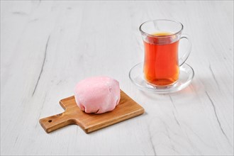 Sweet dessert mochi with strawberry with fruit tea
