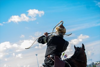 Ottoman archer riding and shooting on horseback