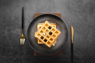 Top view set two waffles with gold cutlery. Resolution and high quality beautiful photo