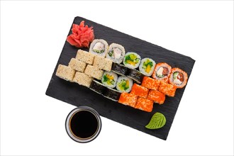 Big set of rolls with traditional garnish isoalted on white background