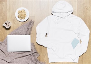 White hoodie with cookies plate laptop. Resolution and high quality beautiful photo