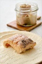 Closeup view of canned sturgeon on a plate