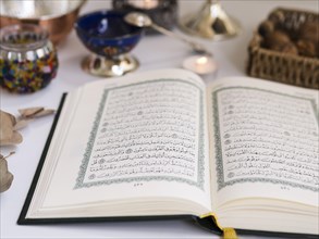 Close up opened quran table