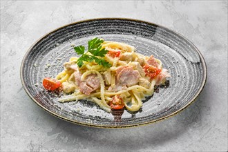 Plate with noodles with ham