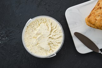 Top view of country style cottage cheese in a pot