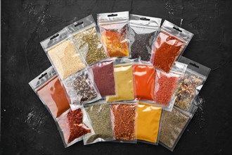 Overhead view of different spices in plastic package