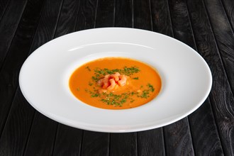 Plate of soup with shrimps