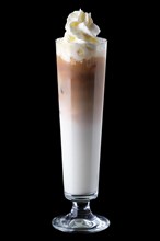 Tall narrow glass with iced coffee isolated on black background