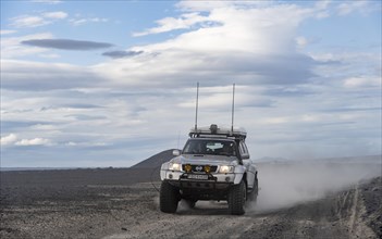 Four-wheel drive vehicle on a track