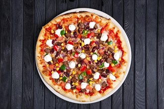 Top view of pizza with beef