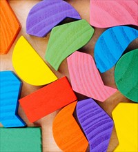 Colorful wooden pieces of a logic puzzle