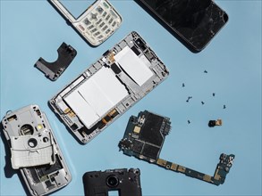 Flat lay disassembled phone parts
