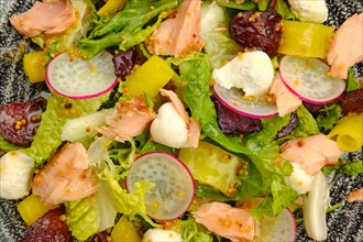 Macro photo of salad with salmon
