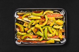 Spicy pumpkin and carrot in baking tray
