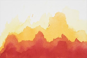 Red yellow mix paints white paper