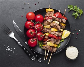 Top view plate with delicious kebab tomatoes. Resolution and high quality beautiful photo
