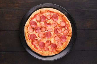 Simple pizza with sausages