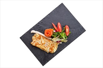 Omelette with salmon isolated on white