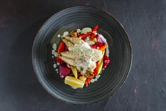 Fried fish fillet with grilled beetroot