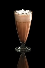 Milkshake coffee summer cocktail with marshmallows isolated on black