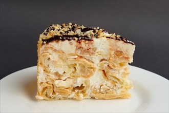 Napoleon layered cake with pastry cream. Close up view