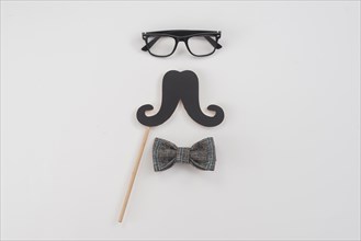 Glasses with paper mustache bow tie