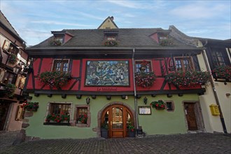 Colourful half-timbered houses in the historic old town of Riquewihr