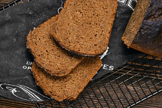 Overhead view of slices of artisan rye bread with rich texture