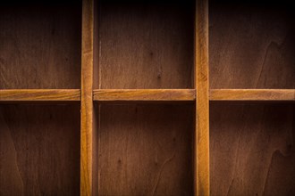 Close up of a wooden box with compartments