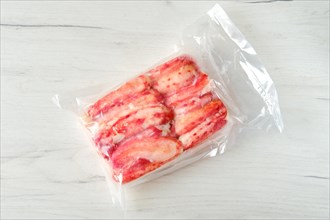 Overhead view of vacuum packed king crab meat