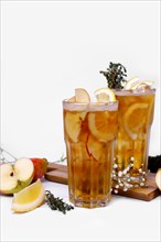 Apple and orange cocktail with beer and ingredients