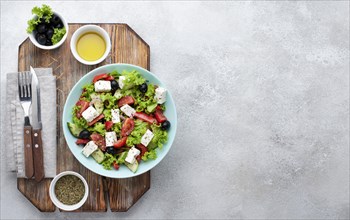 Top view salad with feta cheese cutting board with copy space. Resolution and high quality beautiful photo