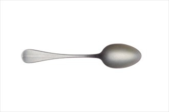 Vintage metal tea spoon isolated on white background