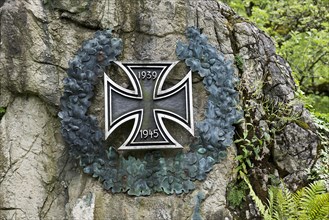 The Iron Cross with laurel wreath on a war memorial of both World Wars