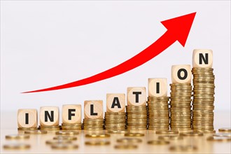 Inflation symbol image finance and economy money crisis as business concept on coins in Stuttgart