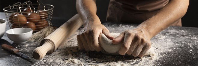 Chef using hands flour knead dough