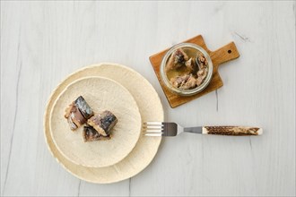 Top view of canned mackerel on a plate