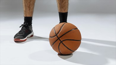 Young man s feet playing basketball. Resolution and high quality beautiful photo