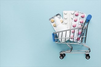 Buying medical supplies with shopping cart concept