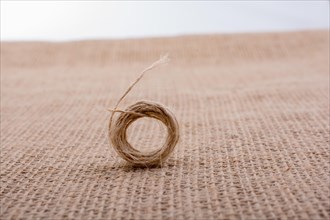 Roll of brown color linen string paper background