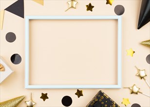 Flat lay birthday decorations with frame