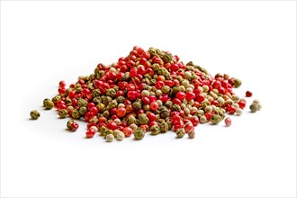 Heap of different types of dry pepper on white background