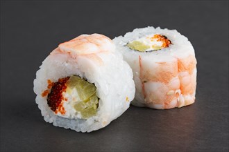 Shrimp rolls with caviar and cucumber