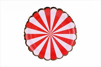 Red and white striped party paper plate isolated on white background
