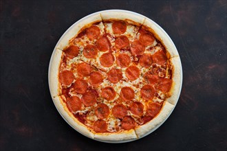 Top view of classic pepperoni pizza