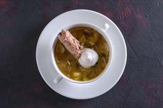 Beef bouillon with meat on a bone