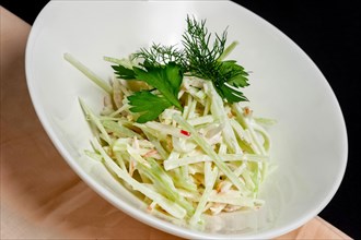 Plate with salad with crab