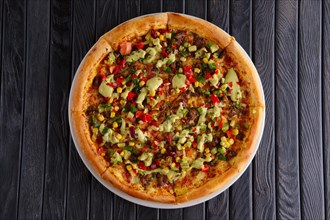 Pizza with ground-meat and vegetables