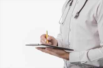 Doctor writing tablet