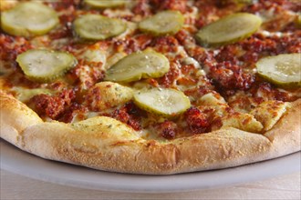 Double cheese pizza with pickled cucumber